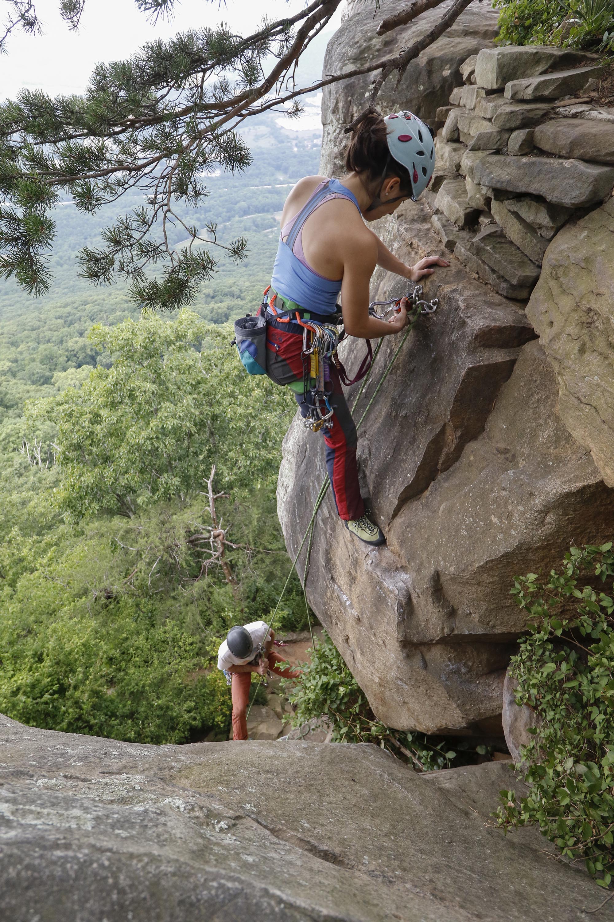 Staff Photo by Dan Henry / The Chattanooga Times Free Press- 6/23/16. Sam Latone and Ana Jimenez simulate a multi pitch climb at Sunset Rock atop Lookout Mountain on June 23, 2016 in preparation for an upcoming trip to Colorado.