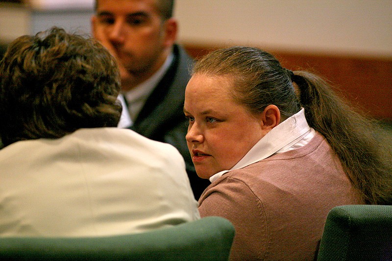 
              Suzanna Brown Simpson listens during the final day of her murder trial in Pickens, S.C.  Thursday, June 23, 2016. Simpson was found guilty on all counts in the deaths of her children and shooting of her husband. (Leland A. Outz/The Greenville News via AP) NO SALES; MANDATORY CREDIT
            