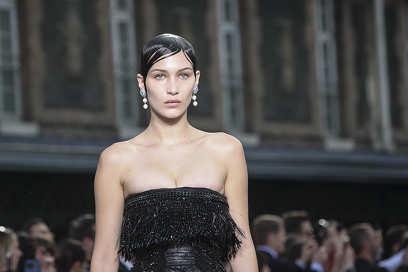 
              Model Bella Hadid wears a creation for Givenchy's Spring Summer 2017 fashion collection presented Friday, June 24, 2016 in Paris. (AP Photo/Kamil Zihnioglu)
            