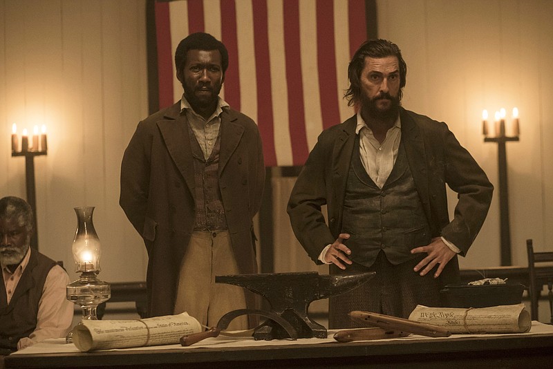 This image released by STX Productions shows Mahershala Ali, left, and Matthew McConaughey in a scene from "The Free State of Jones."