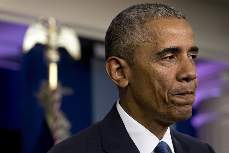 President Barack Obama pauses while speaking in the White House briefing room in Washington, Thursday, June 23, 2016, on the Supreme Court decision on immigration. A tie vote by the Supreme Court is blocking President Barack Obama's immigration plan that sought to shield millions living in the U.S. illegally from deportation.