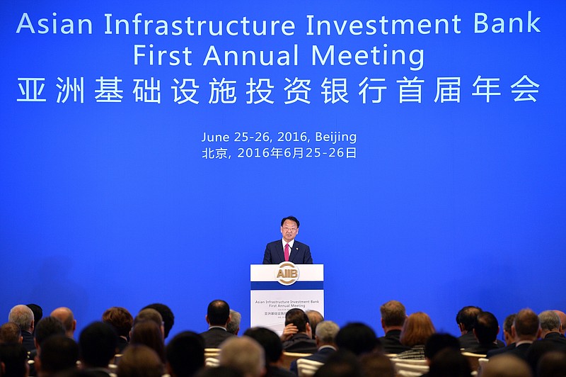 
              In this photo released by China's Xinhua News Agency, South Korea's Deputy Prime Minister Yoo Il-ho speaks at the opening ceremony of the first annual meeting of the Board of Governors of the Asian Infrastructure Investment Bank (AIIB) in Beijing, Saturday, June 25, 2016. Yoo called on governments to show the value of international cooperation as a Chinese-led Asian infrastructure investment bank held its first annual meeting following Britain's vote to leave the European Union. (Li Xin/Xinhua via AP) NO SALES
            
