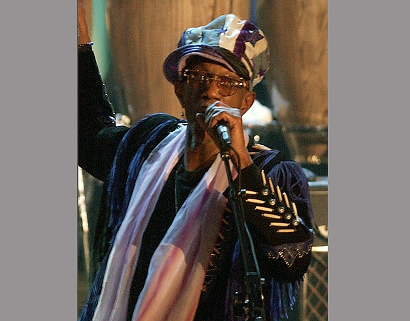 
              FILE - In this March 18, 2002, file photo, Bernie Worrell speaks at the Rock and Roll Hall of Fame in New York. Worrell, whose keyboard sounds and textures helped define the Parliament-Funkadelic musical empire, died of lung cancer at his home in Everson, Wash., on Friday, June 24, 2016. He was 72. (AP Photo/Kathy Willens, File)
            