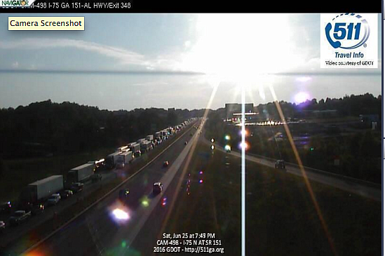 Southbound traffic is at a standstill at Exit 348 in this screenshot from GDOT cameras after a Saturday evening crash. 