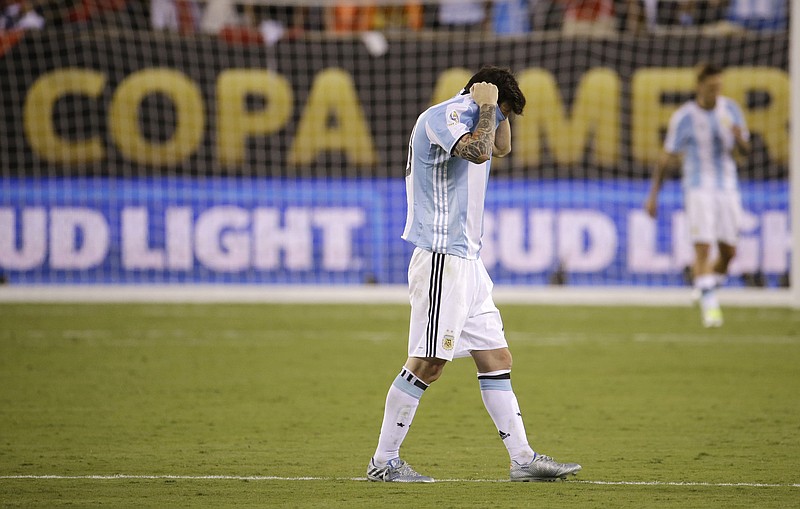 Argentina's Lionel Messi reacts after losing 4-2 to Chile in penalty kicks during the Copa America Centenario championship soccer match, Sunday, June 26, 2016, in East Rutherford, N.J.