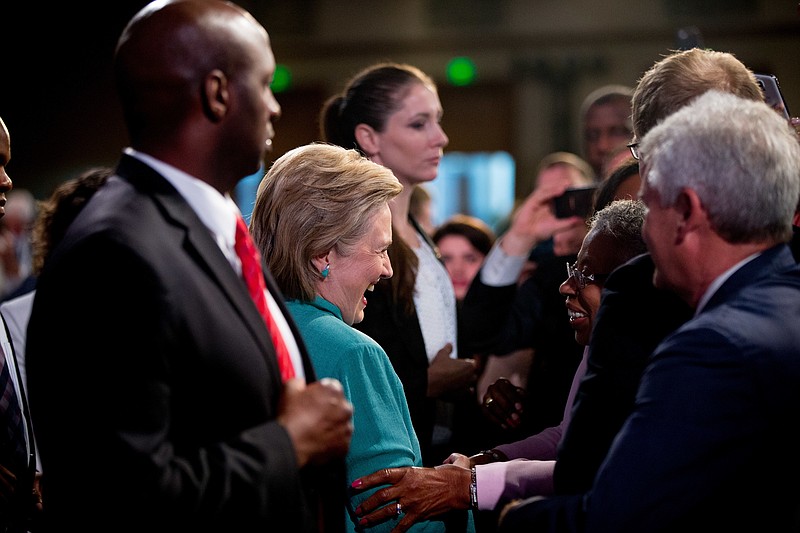 
              Democratic presidential candidate Hillary Clinton greets members of the audience after speaking at the U.S. Conference of Mayors in Indianapolis, Sunday, June 26, 2016, on the United Kingdom's vote to leave the European Union, America's economy, and other issues. (AP Photo/Andrew Harnik)
            