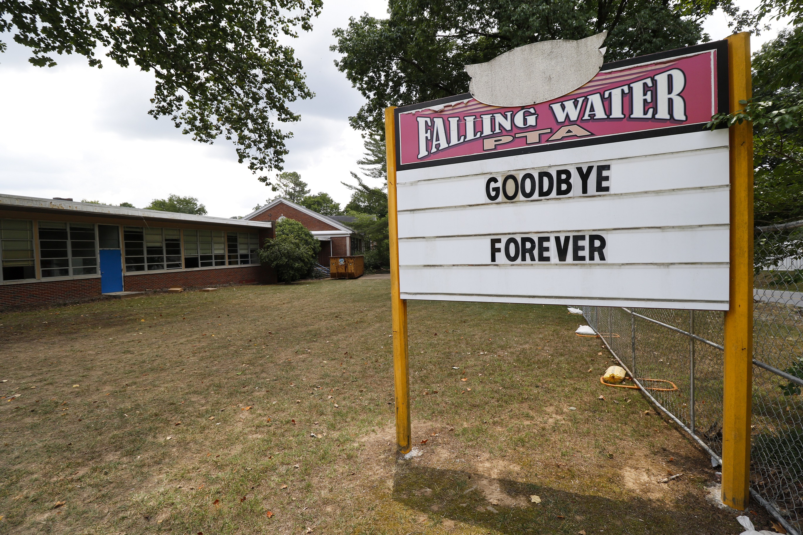 D.H.Griffin Wrecking Company workers begin demolition of the school on June 21.
