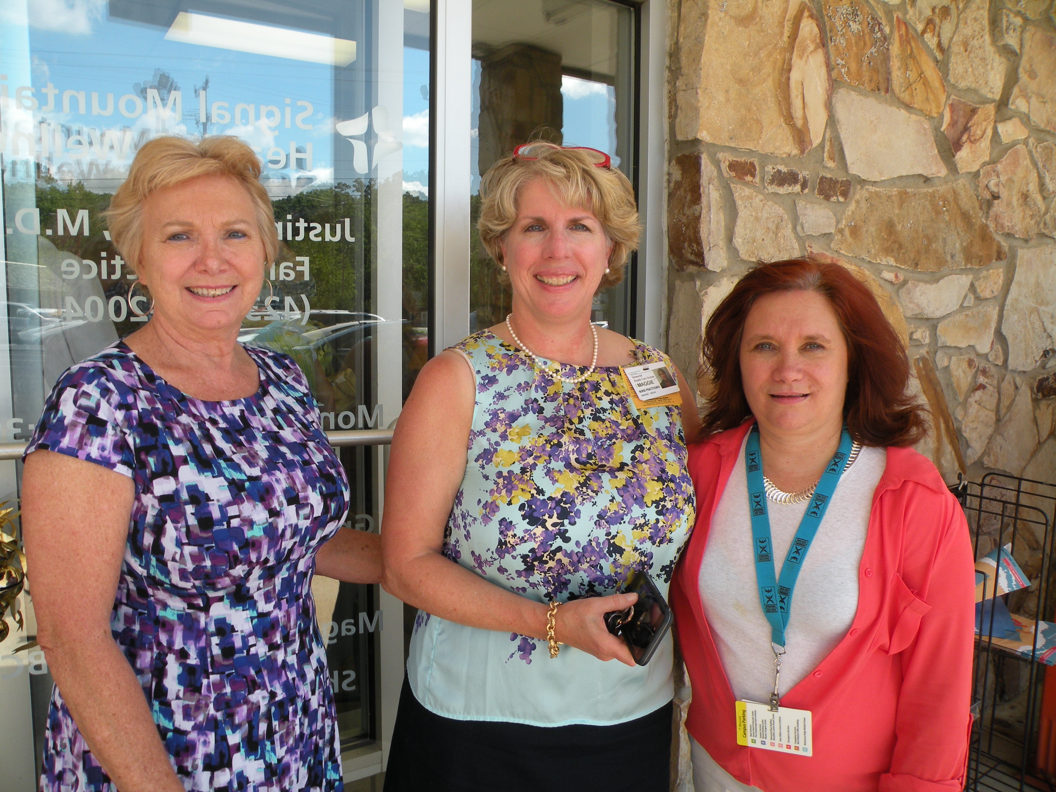 Signal Mountain Health and Wellness staff members greet guests at the open house. From left are Kathy Underwood, referrals; nurse practitioner Maggie Greene and receptionist April Humble.