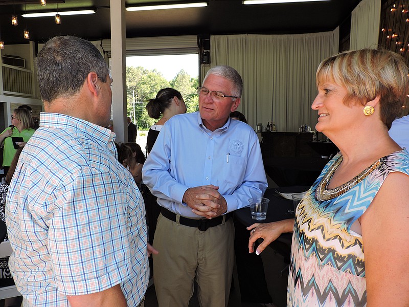 Bo Eubanks, Walker County Sheriff Steve Wilson and his wife Sandy Wilson, from left, talk at the event.