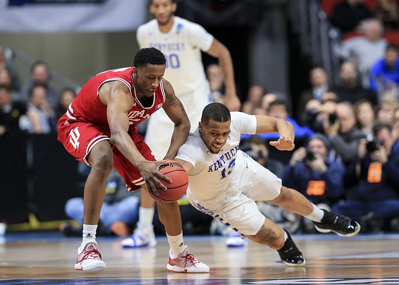 Isaiah Briscoe, right, and Kentucky came up short against Indiana's Troy Williams during an NCAA tournament second-round game in March. The Wildcats were among just three SEC teams in the 68-team NCAA field.