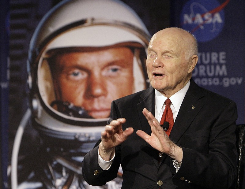 
              FILE - In this Feb. 20, 2012, file photo, U.S. Sen. John Glenn talks with astronauts on the International Space Station via satellite before a discussion titled "Learning from the Past to Innovate for the Future" in Columbus, Ohio. The 94-year-old former U.S. senator and his wife are scheduled to appear at a ceremony Tuesday, June 28, 2016, to rename Port Columbus International Airport in Ohio's capital city as John Glenn Columbus International Airport. (AP Photo/Jay LaPrete, File)
            