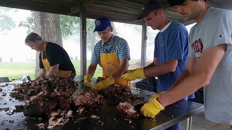Members of the Signal Mountain Lions Club have prepared barbecue for the annual Independence Day celebration for the past 40-plus years. Plates will be ready to serve at 11 a.m. Monday, July 4, at Althaus Park behind Signal Mountain Golf and Country Club. This year's fireworks display will move to Shackleford Ridge Park behind Signal Mountain Middle/High School.