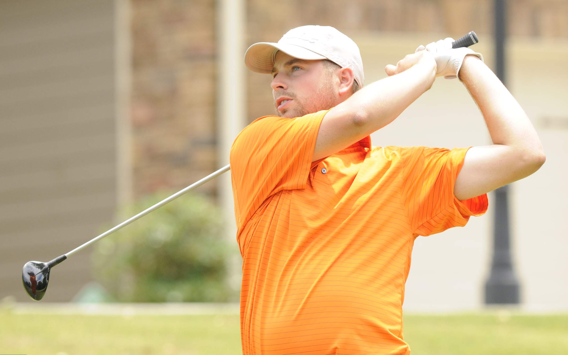 Casey Flenniken hits his tee shot at No. 18 on Tuesday at Creeks Bend Golf Club in Hixson.