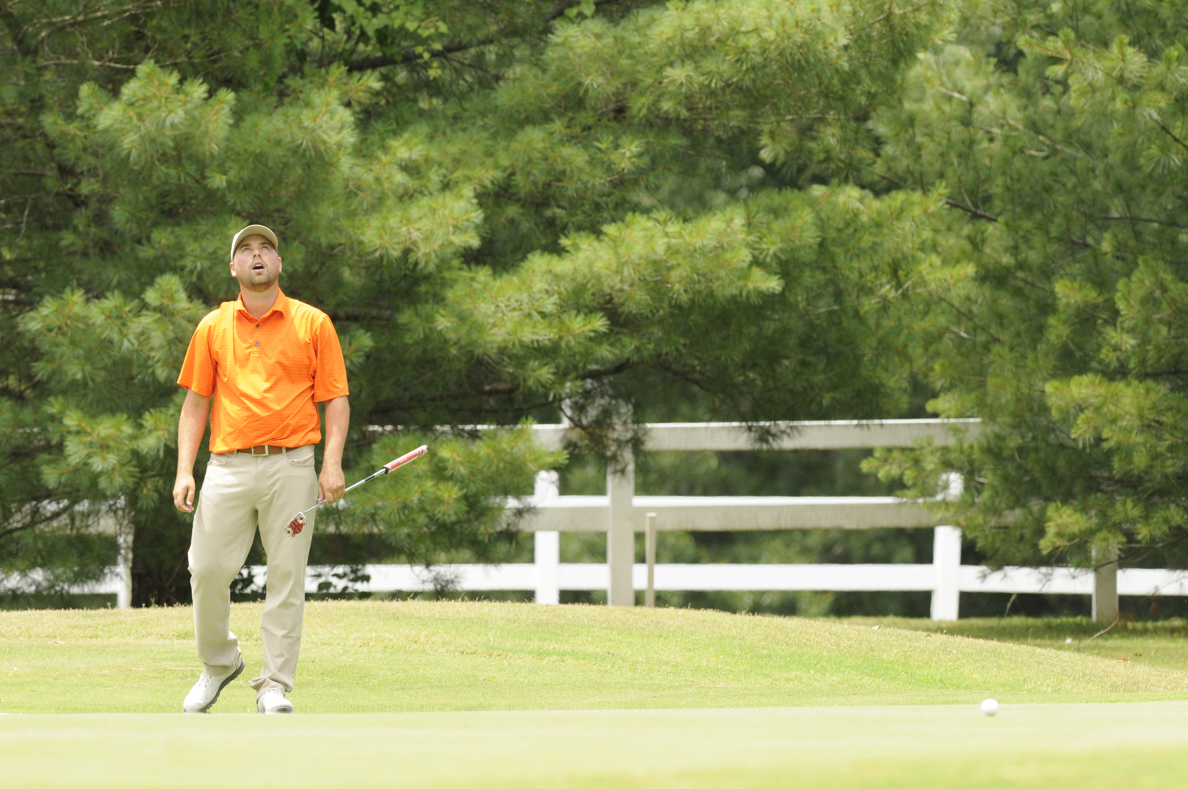 Casey Flenniken reacts to missing his birdie try at No. 18 before completing his 6-under-par tournament win at Creeks Bend Golf Club in Hixson on Tuesday.