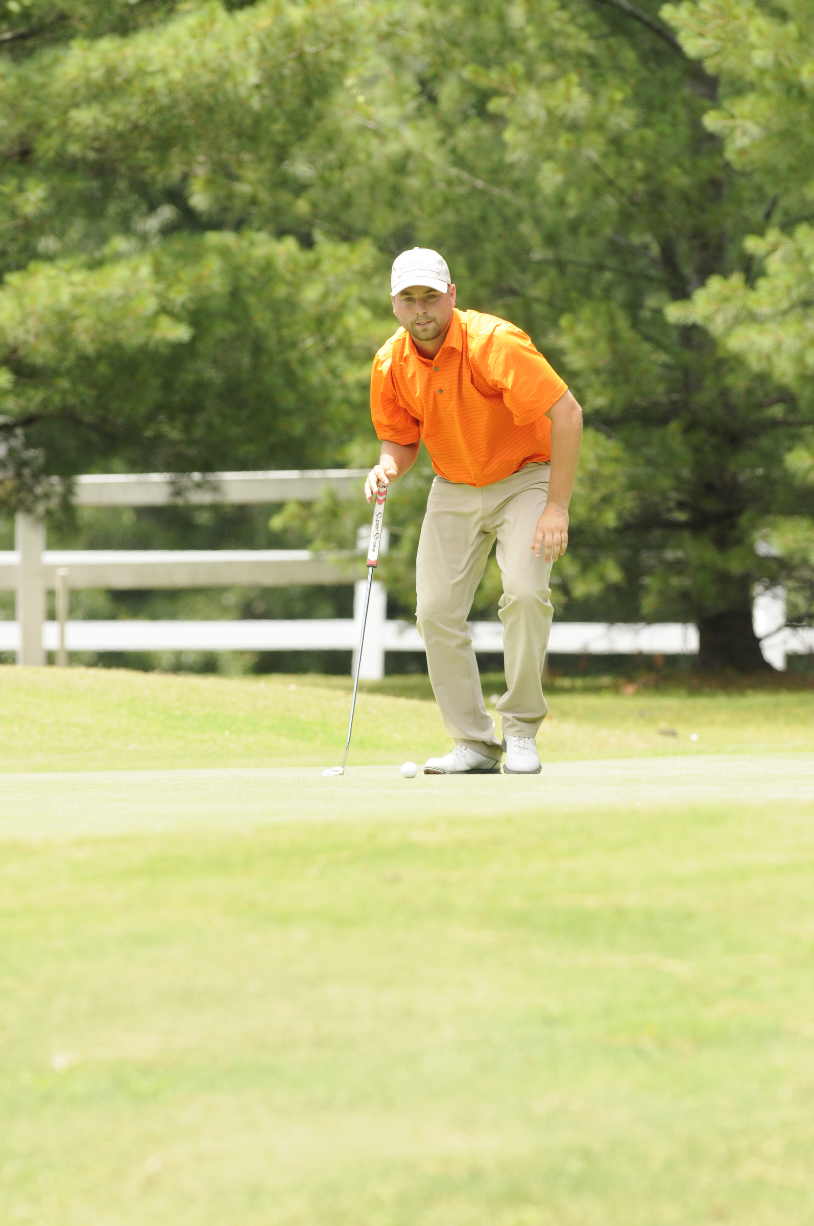 Casey Flenniken tales a look as his final put in the Ira Templeton Golf tournament Tuesday at No. 18. Flenniken finished with a 6-under-par tournament win edging out a 5-under finish by Marshall Talkington at Creeks Bend Golf Club in Hixson.
