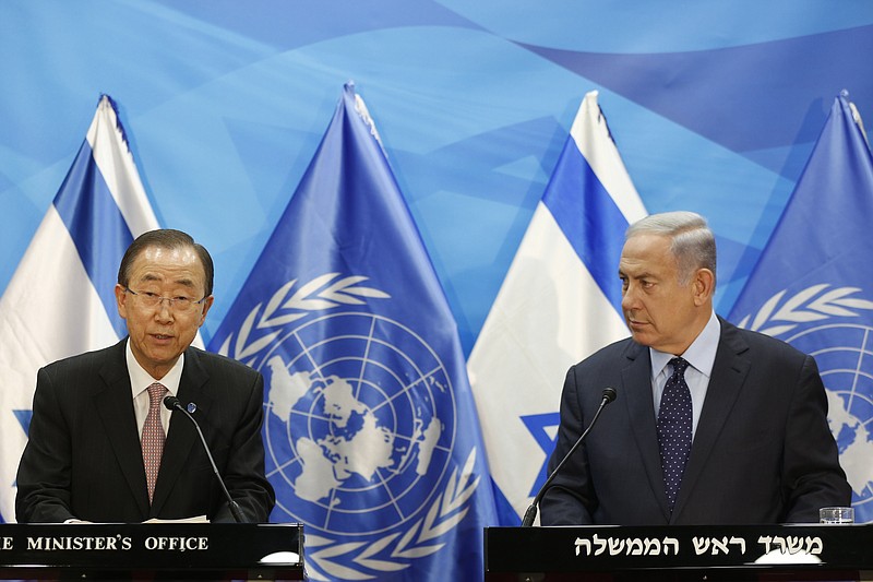 
              Israeli Prime Minister Benjamin Netanyahu, right, looks at UN Secretary General Ban Ki-moon during a joint press conference in Jerusalem, Tuesday, June 28, 2016. (Ronen Zvulun/Pool Photo via AP)
            