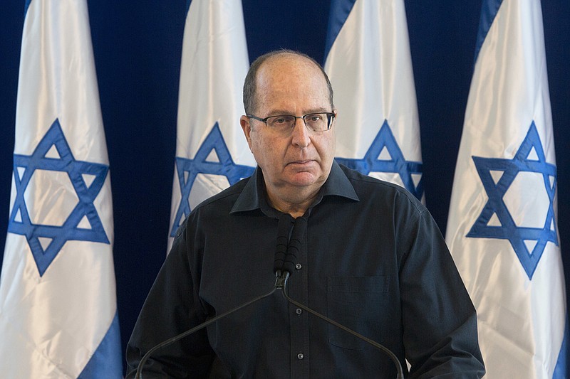 
              File - In this Friday, May 20, 2016 file photo, Israel's Defense Minister Moshe Yaalon, speaks during a press conference at the Defense Ministry in Tel Aviv, Israel. Israel's defense minister announced his resignation on Friday, citing a lack of "trust" in Prime Minister Benjamin Netanyahu after reports in recent days that he is soon to be replaced. Israel’s long-serving Benjamin Netanyahu faces a potentially formidable challenge to his hardline rule _ not from civilian politicians but instead from the country’s revered security establishment. (AP Photo/Sebastian Scheiner, File)
            