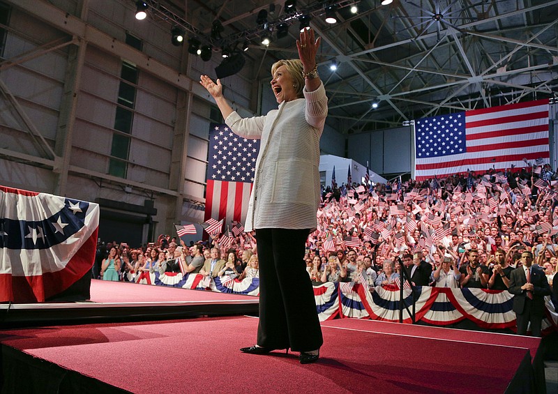 Being super-fashionable has never been a major focus for Hillary Clinton, say local fashion experts. But pantsuits are a good choice for her, they say. (AP Photo/Julie Jacobson)