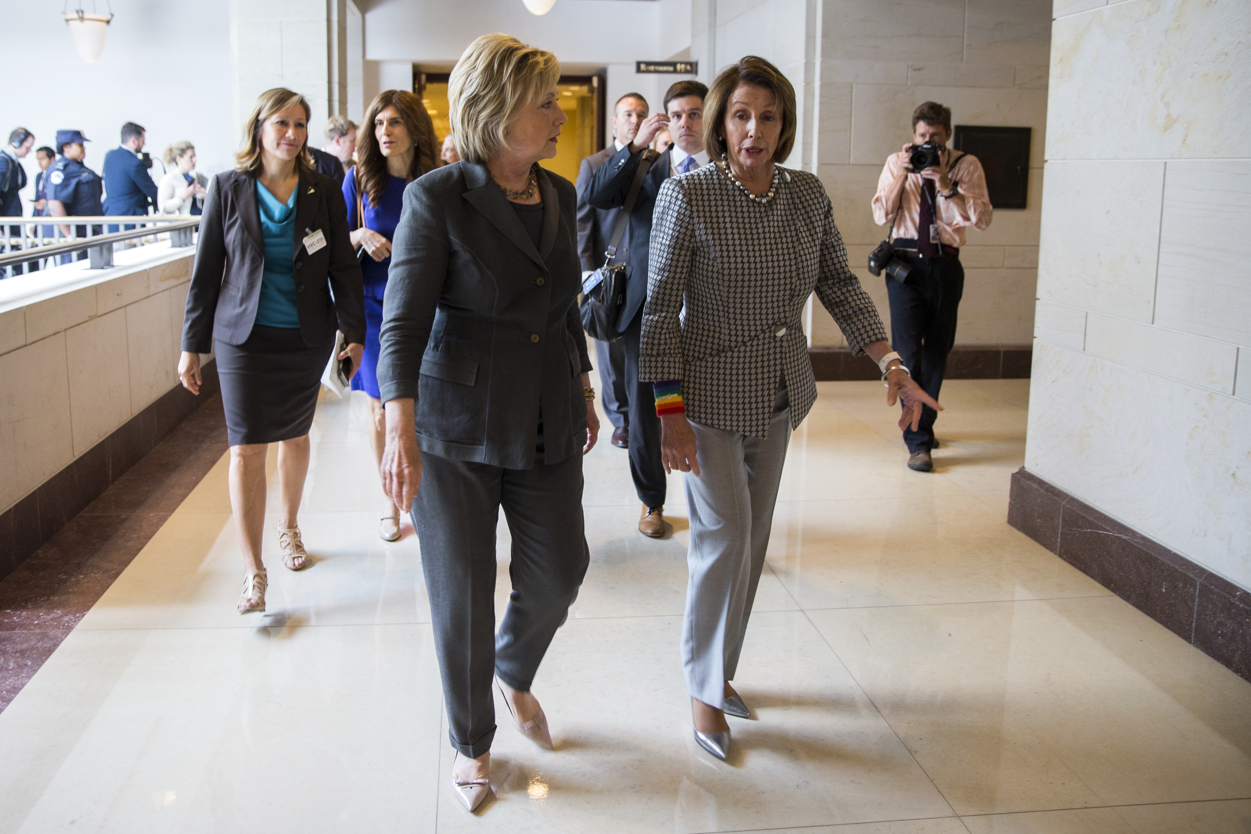 Being super-fashionable has never been a major focus for Hillary Clinton, say local fashion experts. But pantsuits are a good choice for her, they say. (AP Photo/Evan Vucci)