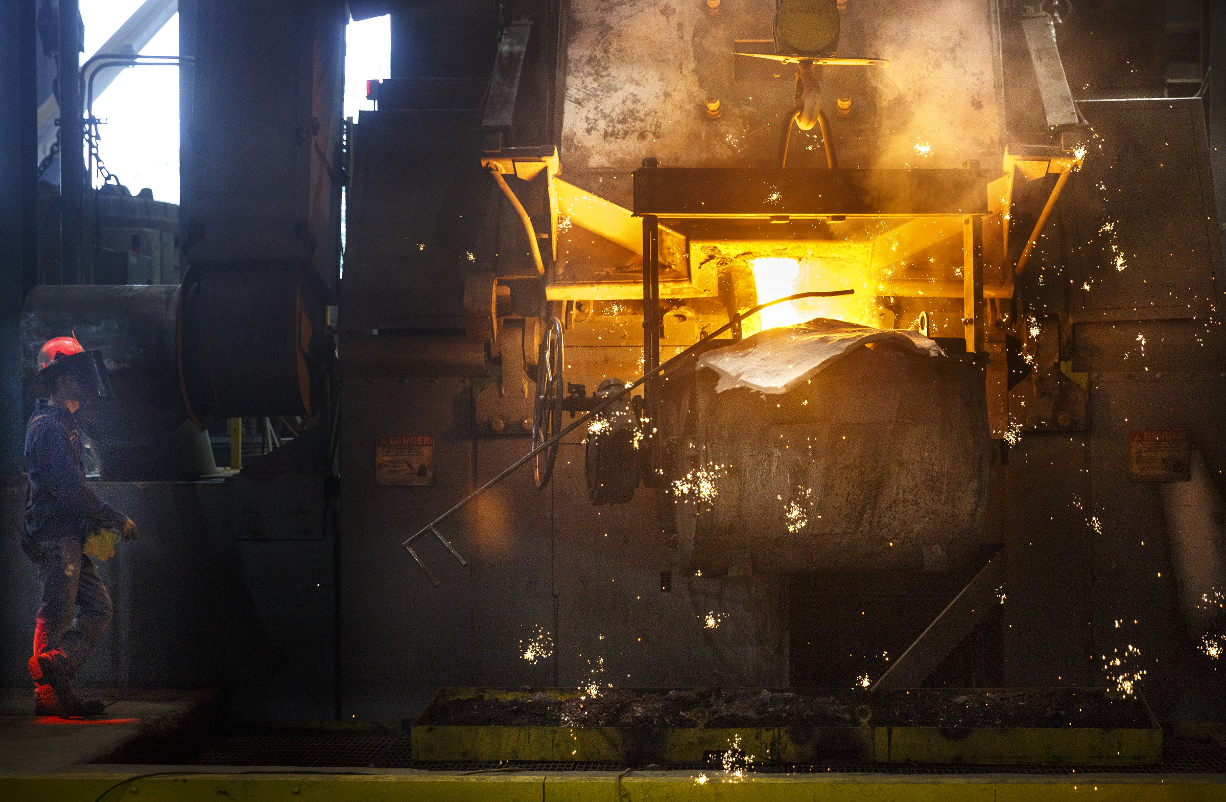A bull is loaded with molten metal from a furnace at Lodge Manufacturing on Wednesday, June 29, 2016, in South Pittsburg, Tenn. The cast iron cookware manufacturer broke ground Wednesday on a new foundry.