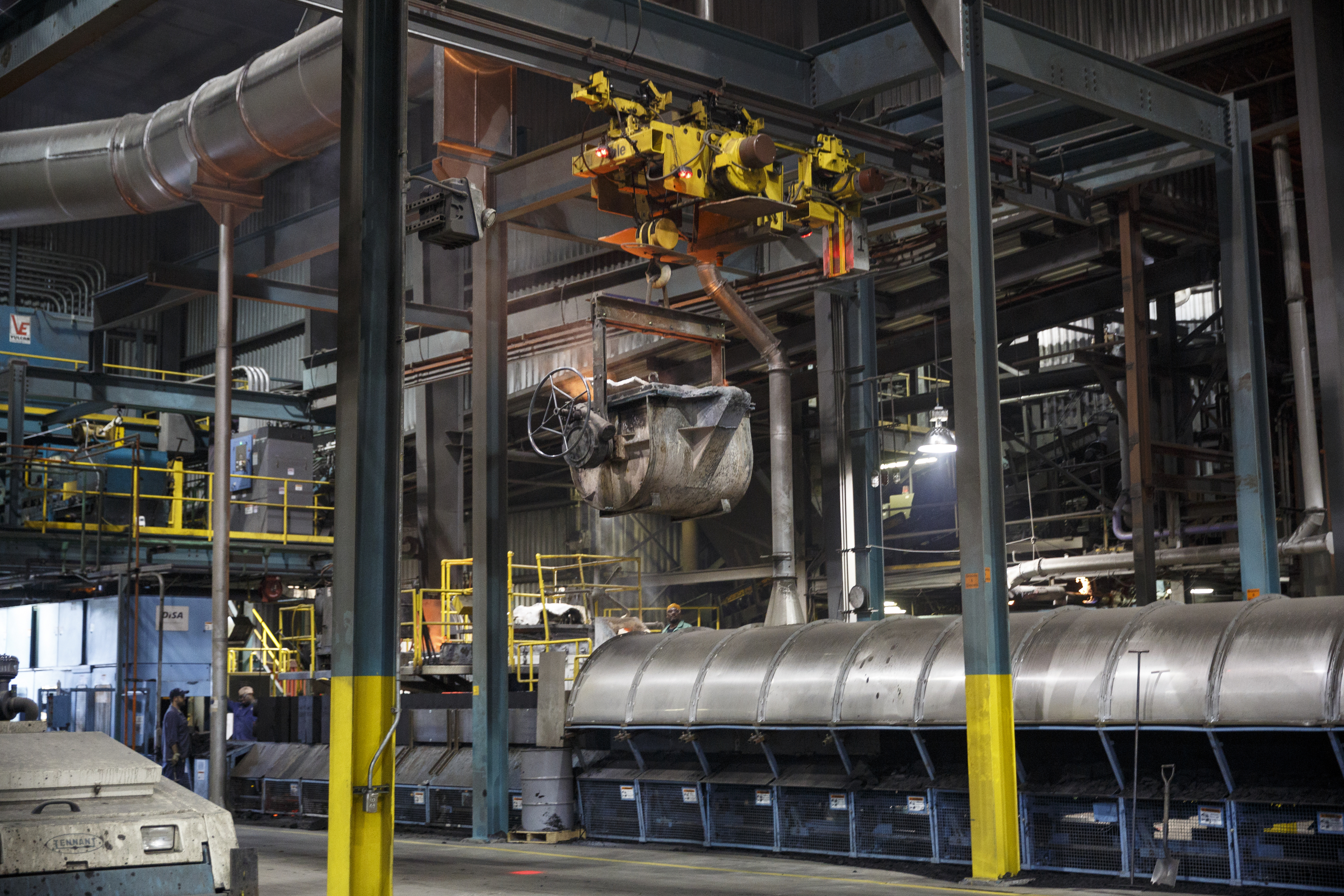 A bull containing molten metal is directed by remote control to a molding machine at Lodge Manufacturing on Wednesday, June 29, 2016, in South Pittsburg, Tenn. The cast iron cookware manufacturer broke ground Wednesday on a new foundry.