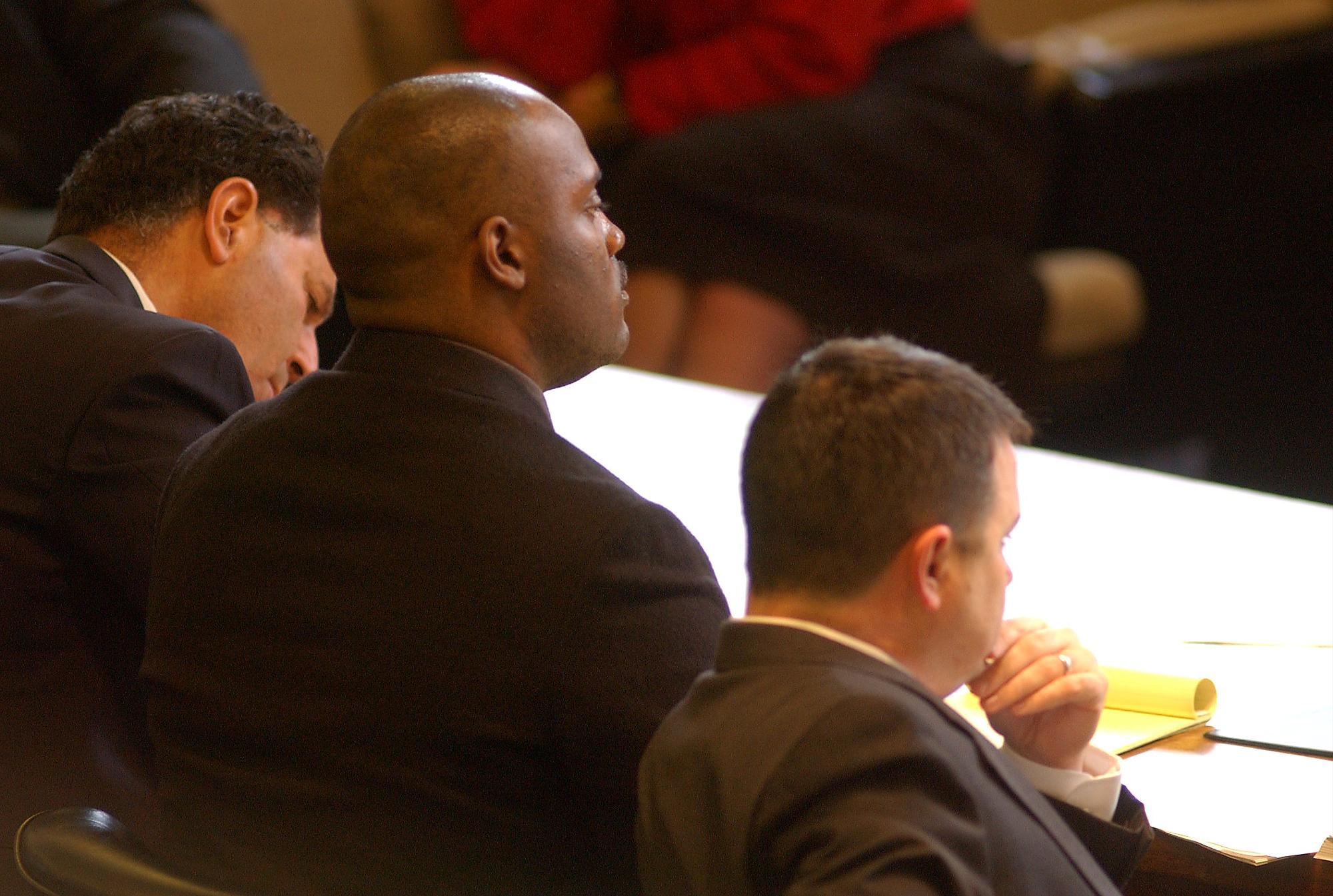Brent Marsh,center, sits with his defense attorneys during a hearing Friday, February 7, 2003 at the Walker County Courthouse in LaFayette, Ga. Four Grand Jury motions and one bond motion were heard by Superior Court Judge James G. Bodiford during the proceeding.