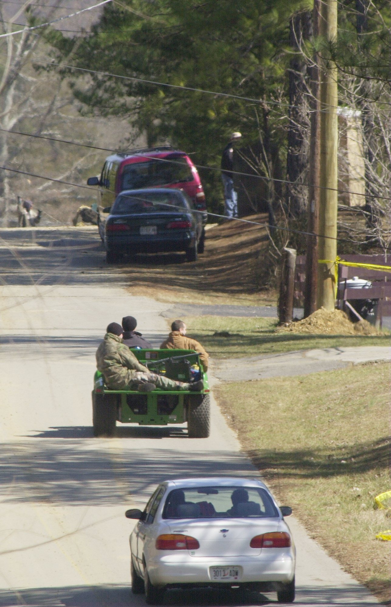 Workers are shuttled into the Tri-State Crematory in Noble, Ga. Monday where GBI agents continue  to investigate the discovery of more than 300 bodies.