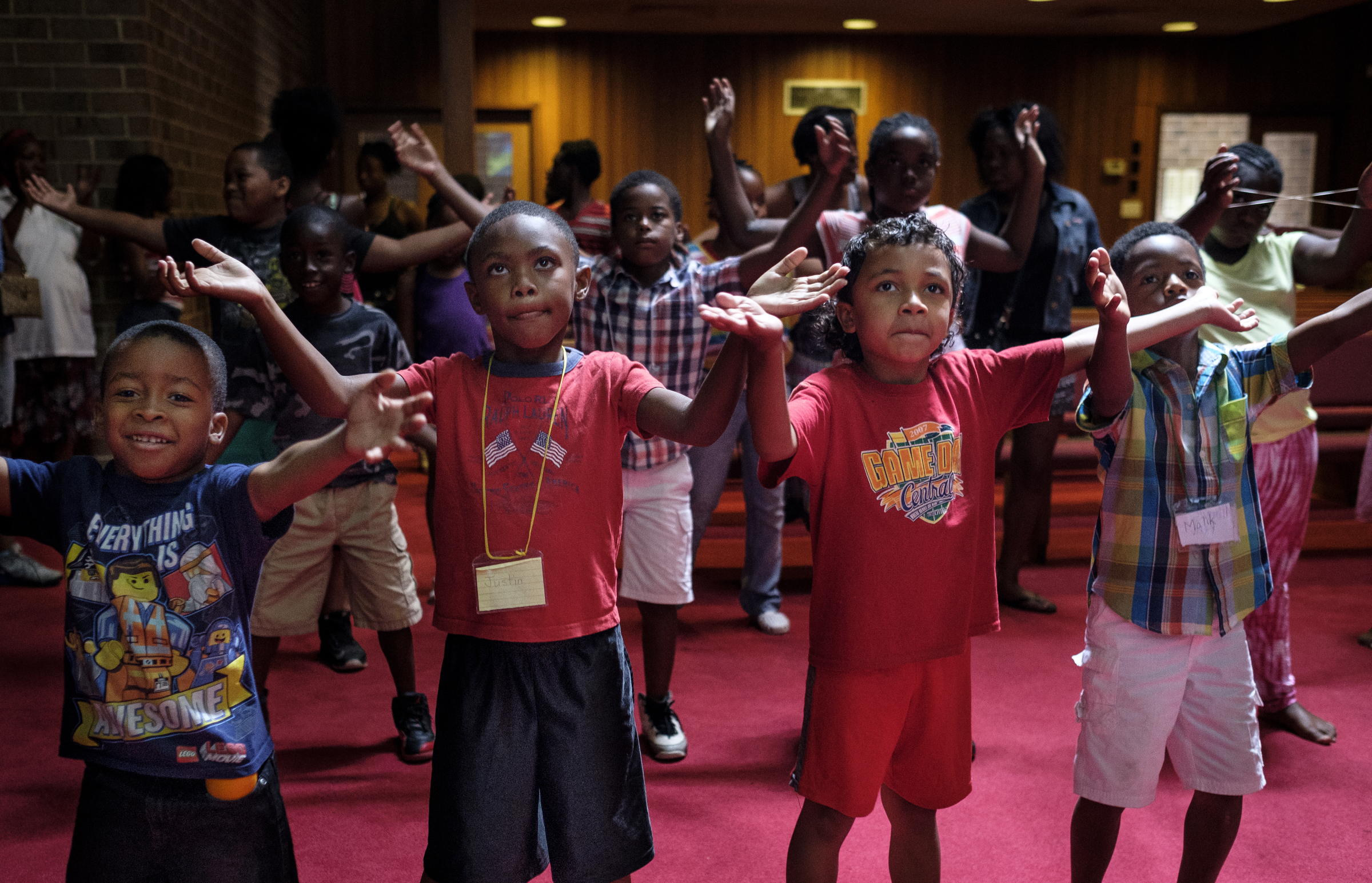 Trayvon Washington, Justin Longfort, Leo Jenkins, and Malik Robinson, from left, dance along with music at a camp for kids operated by Gloria Griffith at Renaissance Presbyterian Church on Tuesday, June 28, 2016, in Chattanooga, Tenn. Griffith has operated the camp for 5 years, but because of health problems, Griffith expects that she will have to end the camp this month if she can't find someone to take her place.