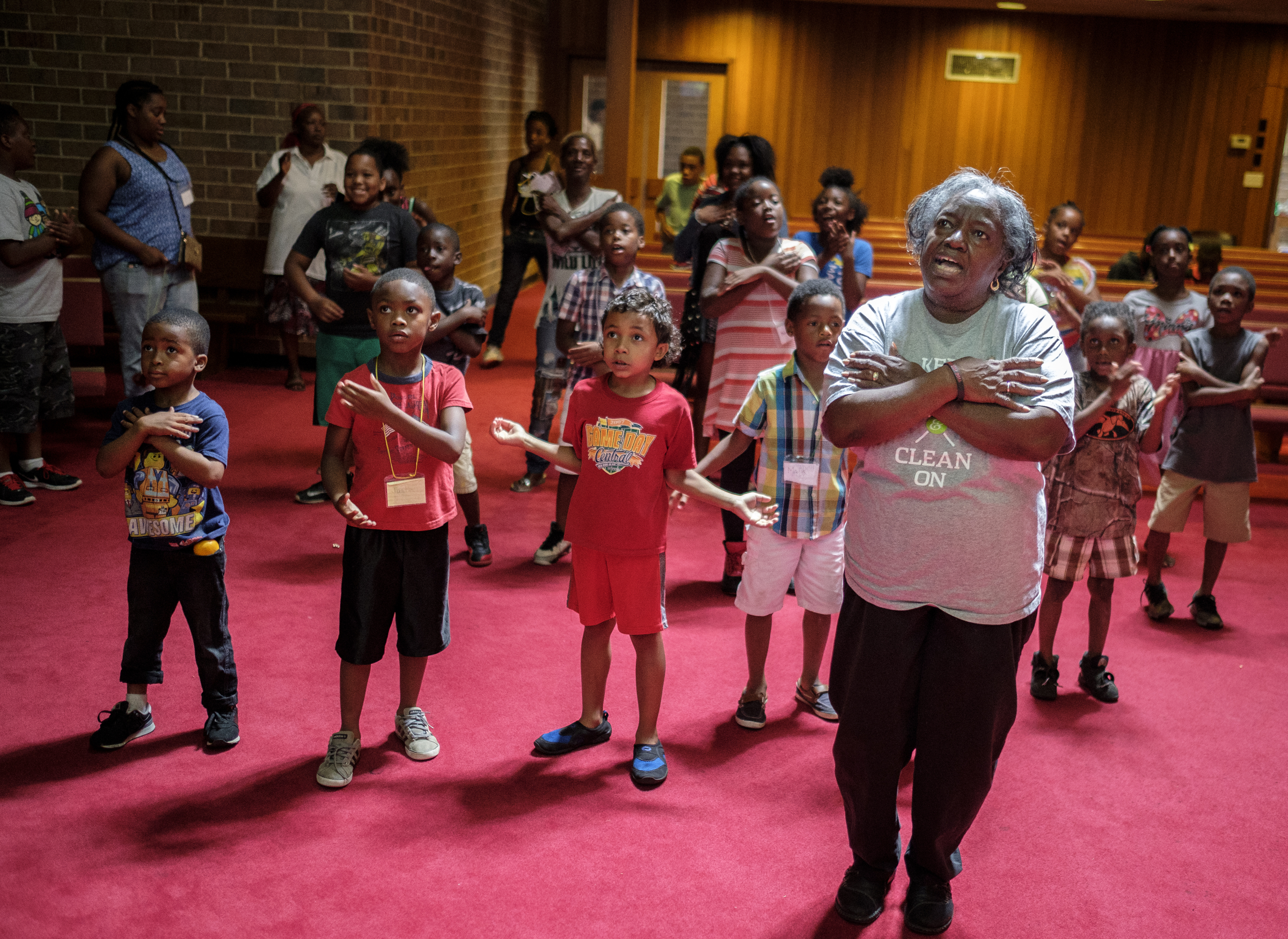 Gloria Griffith leads children in a dance at a camp for kids which she operates at Renaissance Presbyterian Church on Tuesday, June 28, 2016, in Chattanooga, Tenn. Griffith has operated the camp for 5 years, but because of health problems, Griffith expects that she will have to end the camp this month if she can't find someone to take her place.