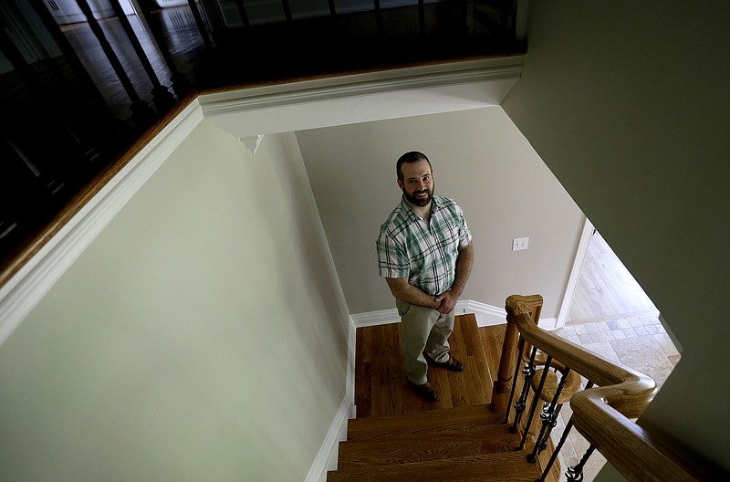 
              In this Wednesday, June 22, 2016, photo, Tom Wicklow poses for a picture in Morristown, N.J. Wicklow, a former Marine who recently got his MBA, is buying a franchise of Let Mommy Sleep, which provides baby nurses and other help to new parents. (AP Photo/Julio Cortez)
            