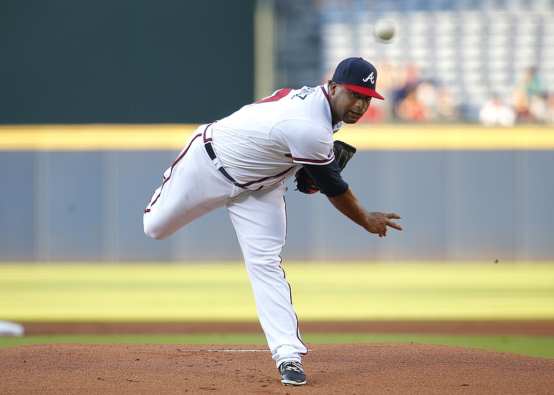 Atlanta Braves starting pitcher Joel De La Cruz delivers in the first inning of a baseball game against the Cleveland Indians, Wednesday, June 29, 2016, in Atlanta. (AP Photo/Todd Kirkland)