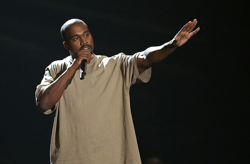 
              FILE - In this Aug. 30, 2015, file photo, Kanye West accepts the video vanguard award at the MTV Video Music Awards at the Microsoft Theater in Los Angeles. West and Adidas are expanding their partnership that began almost two years ago with retail hubs for his Yeezy products and additional sportswear designs. The sportswear company announced the collaboration on Wednesday, June 29, 2016, and described it as the most significant partnership between a non-athlete and an athletic brand. (Photo by Matt Sayles/Invision/AP, File)
            