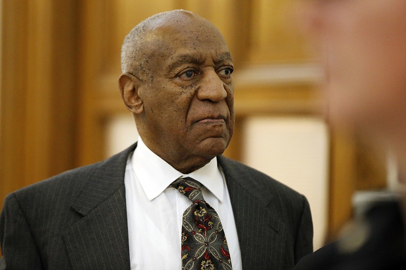 
              FILE - In this May 24, 2016 file photo, Bill Cosby departs the Montgomery County Courthouse after a preliminary hearing, in Norristown, Pa.  Hugh Hefner’s attorneys are asking a judge to dismiss the Playboy founder from a lawsuit filed by a woman who accuses Bill Cosby of abusing her at the Playboy Mansion in 2008. A motion filed Tuesday, June 28,  in a Los Angeles federal court contends that a lawsuit filed by former model Chloe Goins is barred by the statute of limitations, and she has not pleaded facts that would allow the case to proceed. (AP Photo/Matt Rourke, Pool)
            