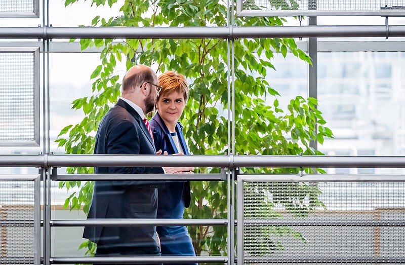 
              European Parliament President Martin Schultz, left, walks with Scottish First Minister Nicola Sturgeon at the European Parliament in Brussels on Wednesday, June 29, 2016. Sturgeon is in Brussels to meet with European Parliament fraction leaders. (AP Photo/Geert Vanden Wijngaert)
            