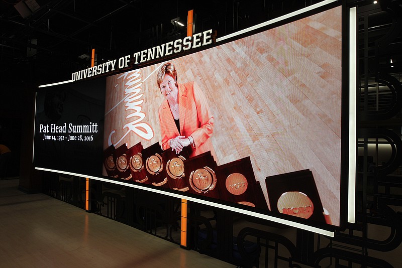 The video board inside the University of Tennessee Media Center displays a memorial to Pat Summitt Tuesday, June 28, 2016, in Knoxville, Tenn. Summitt, the winningest coach in Division I college basketball history who uplifted the women's game from obscurity to national prominence during her career at Tennessee, died Tuesday morning, June 28, 2016. She was 64.