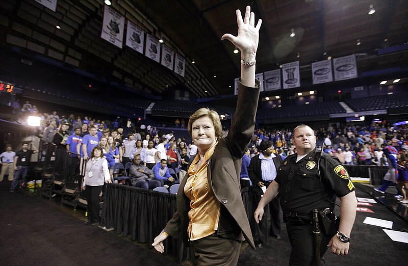 In this March 19, 2012, file photo, Tennessee head coach Pat Summitt waves as she leaves the court after Tennessee defeated DePaul 63-48 in an NCAA tournament second-round women's college basketball game in Rosemont, Ill. Summitt, the winningest coach in Division I college basketball history who uplifted the women's game from obscurity to national prominence during her career at Tennessee, died Tuesday morning, June 28, 2016. She was 64.