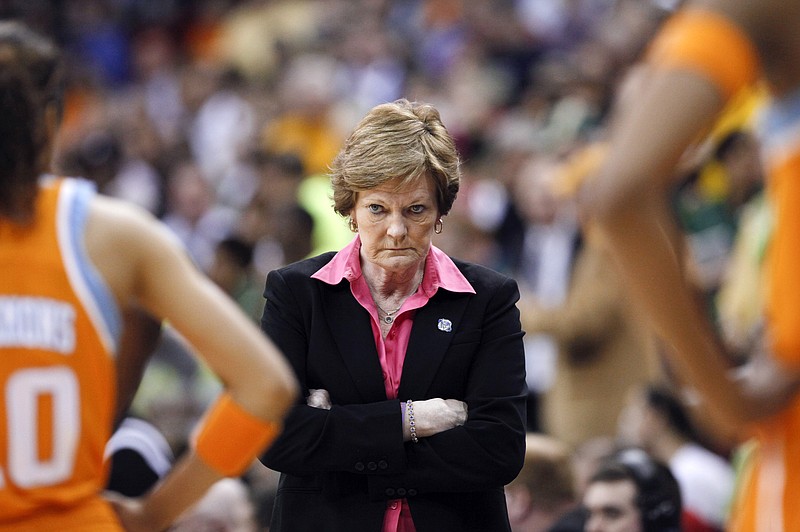 n this March 26, 2012, file photo, Tennessee coach Pat Summitt waits for her players during a timeout in the second half of an NCAA women's college basketball tournament regional final against Baylor in Des Moines, Iowa. Summitt, the winningest coach in Division I college basketball history who uplifted the women's game from obscurity to national prominence during her career at Tennessee, died Tuesday morning, June 28, 2016. She was 64.