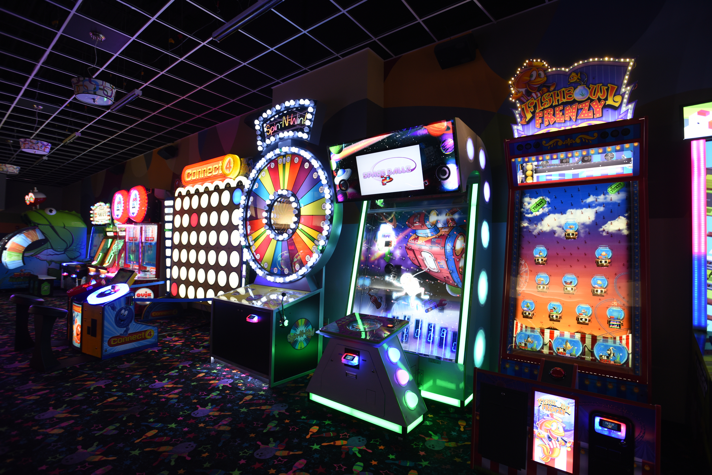 Video games fill a room Tuesday, June 28, 2016 at Pin Strikes Bowling.