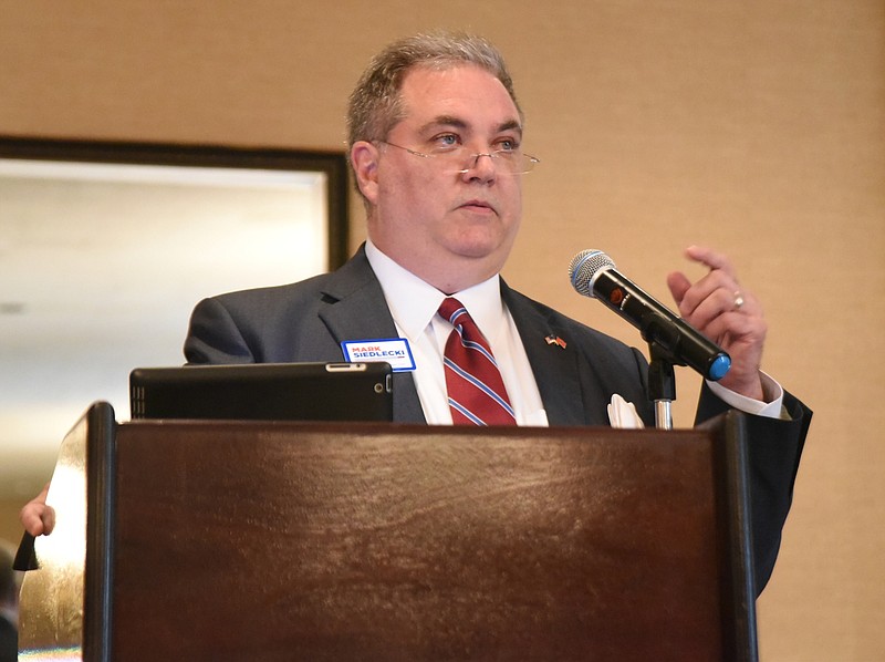 Hamilton County Assessor of Property candidate Mark Siedlecki participates in a forum at the Kiwanis Club meeting on June 21 at the Mountain City Club.
