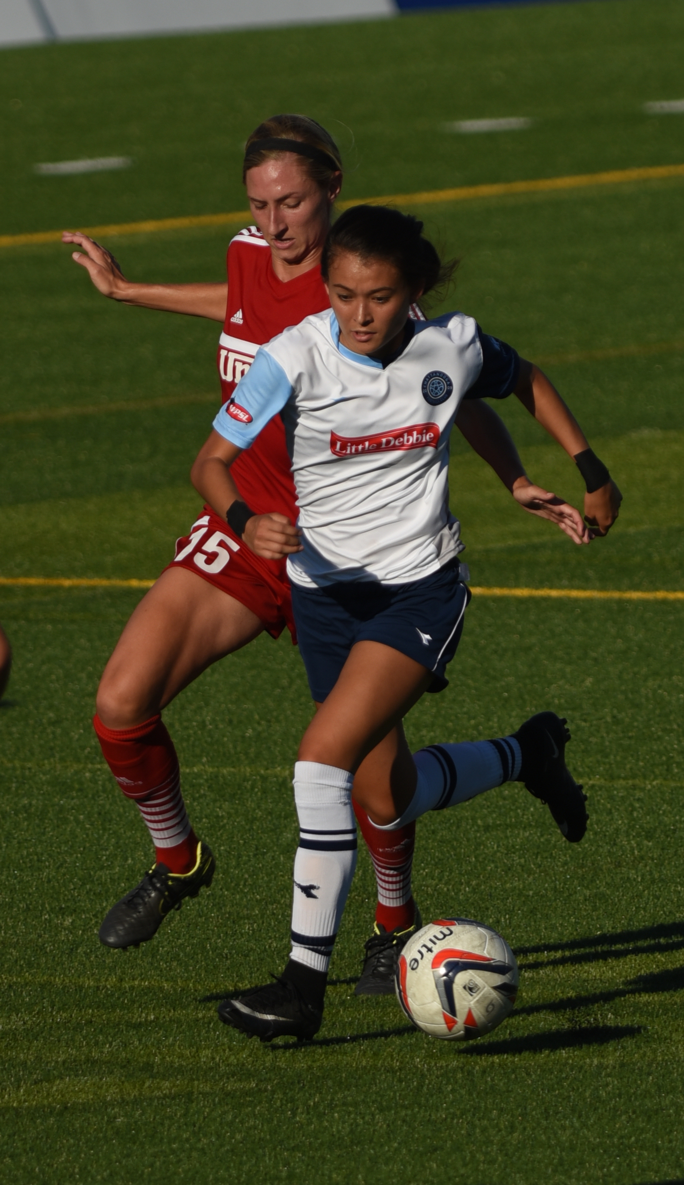 Chattanooga Football Club's McKenna Davidson and Atlanta's Brook Hendrix battle for control of the ball Thursday, June 30, 2016 at Finley Stadium.