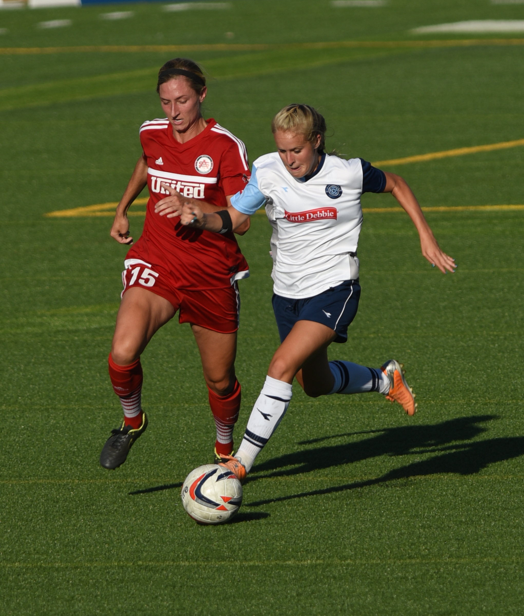 Chattanooga Football Club's Summer Lanter and Atlanta's Brooke Hendrix pursue the ball Thursday, June 30, 2016 at Finley Stadium.