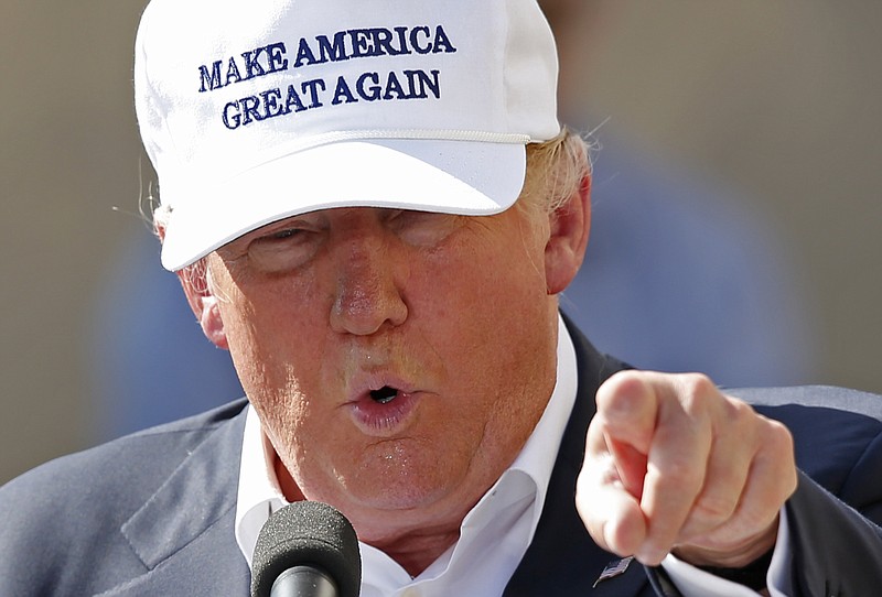 
              Republican presidential candidate Donald Trump speaks at a town hall-style campaign event at the former Osram Sylvania light bulb factory, Thursday, June 30, 2016, in Manchester, N.H. (AP Photo/Robert F. Bukaty)
            