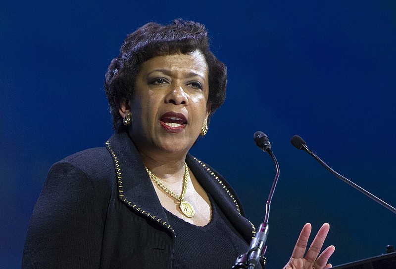 
              FILE - In this June 14, 2016 file photo, Attorney General Loretta Lynch speaks in Washington. Former President Bill Clinton spoke with Lynch during an impromptu meeting in Phoenix, but Lynch says the discussion did not involve the investigation into Hillary Clinton's email use as secretary of state. (AP Photo/Cliff Owen, File)
            