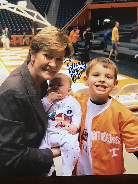 The late Pat Summitt smiles with the Zahrobsky boys — Roman and Frankie — courtside in 2007.