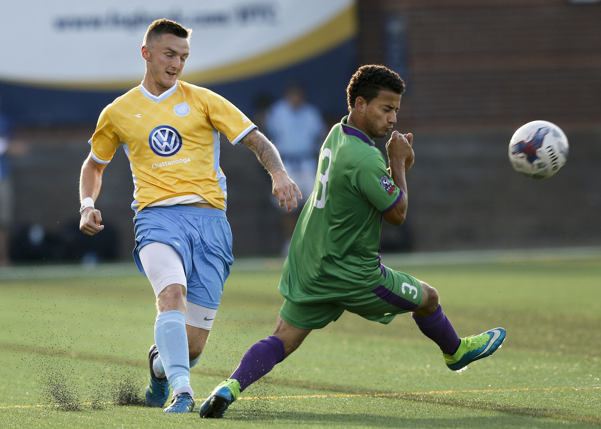 CFC's Jon Finlay, left, moves the ball around New Orleans player Rolando Sanchez during CFC's soccer match against the New Orleans Jesters at Finley Stadium on Saturday, July 2, 2016, in Chattanooga, Tenn.