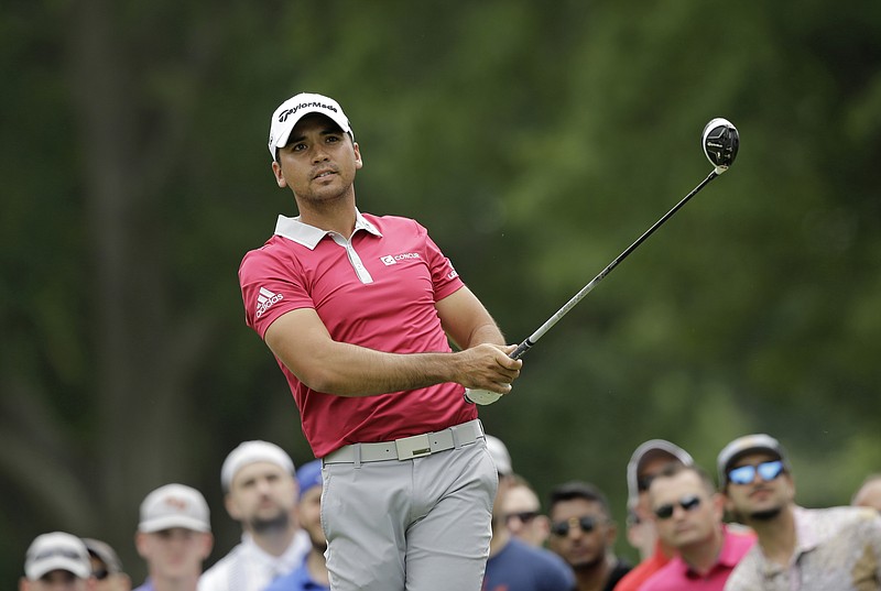 
              Jason Day, from Australia, tees off on the third hole during the final round of the Bridgestone Invitational golf tournament at Firestone Country Club, Sunday, July 3, 2016, in Akron, Ohio. (AP Photo/Tony Dejak)
            