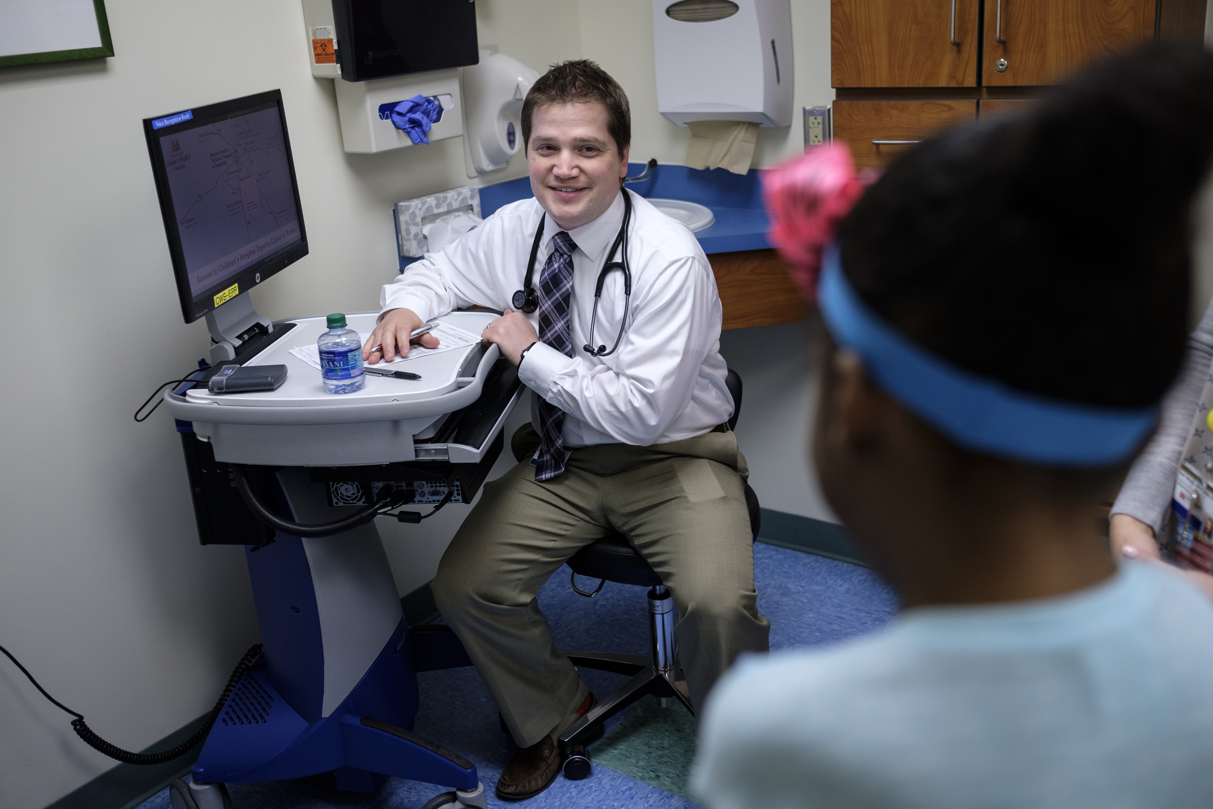 Dr. Justin Godown talks with Ahmya Calloway during one of Ahmya's regular checkups to monitor her new heart at Vanderbilt Children's Hospital on Thursday, June 30, 2016, in Nashville, Tenn. Almost two months after receiving a heart and kidney transplant, Ahmya was told she could transition to once-weekly checkups and return home to Chattanooga.