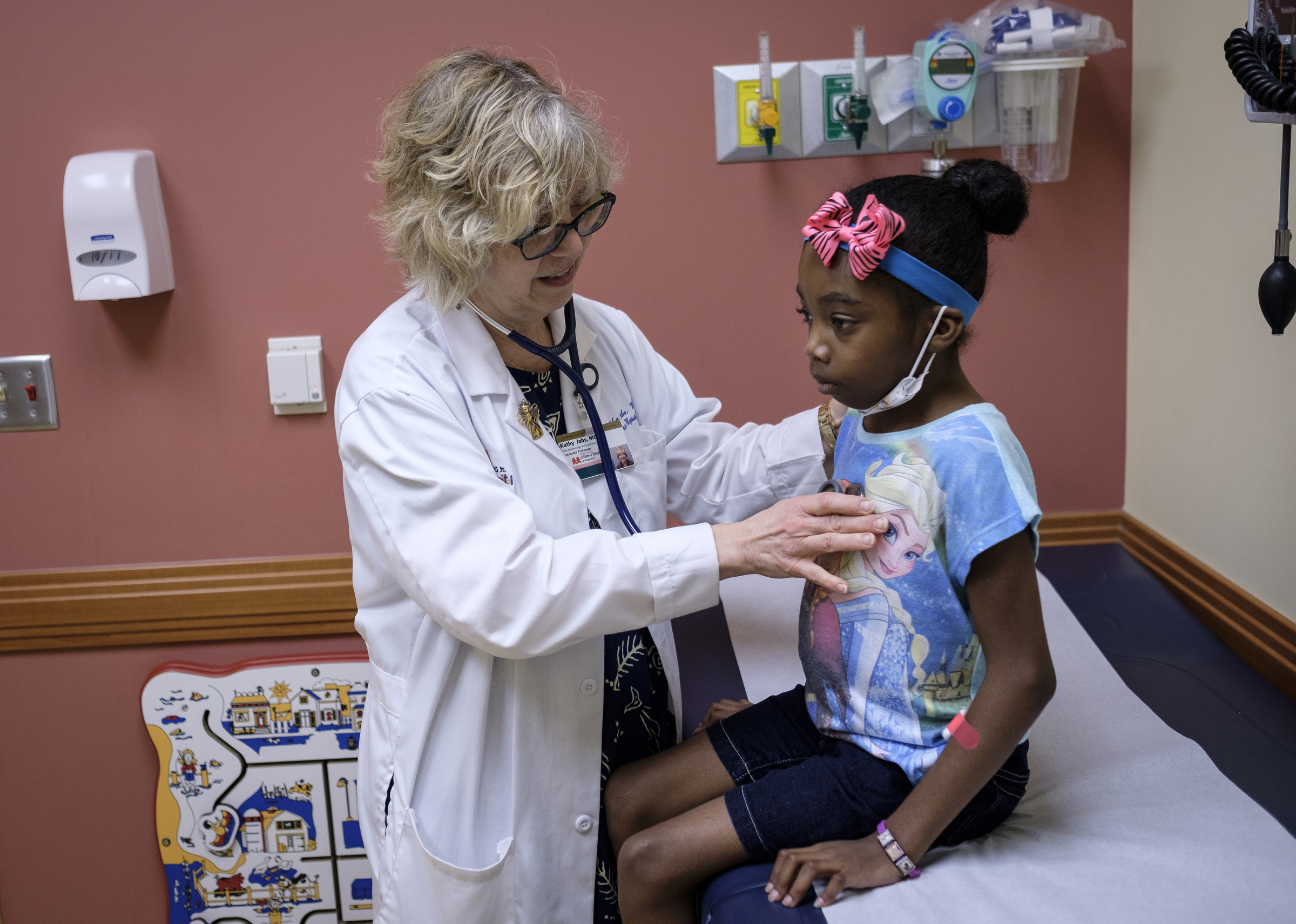 Dr. Kathy Jabs examines Ahmya Calloway during one of Ahmya's regular checkups to monitor her new kidney at Vanderbilt Children's Hospital on Thursday, June 30, 2016, in Nashville, Tenn. Almost two months after receiving a heart and kidney transplant, Ahmya was told she could transition to once-weekly checkups and return home to Chattanooga.