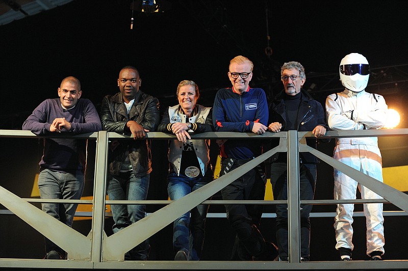 
              FILE - In this file photo dated May 25, 2016 showing the new BBC flagship car show Top Gear presenters, left to right, Chris Harris, Rory Reid, Sabine Schmitz, Chris Evans, Eddie Jordan and The Stig, during the launch of the car show at Dunsfold Aerodrome, England, Monday June 27, 2016. Figures released Monday July 4, 2016, show the revamped TV show featuring lead presenters Matt LeBlanc and Chris Evans, has failed to attract high numbers of viewers. (Andrew Matthews / PA FILE via AP)
            