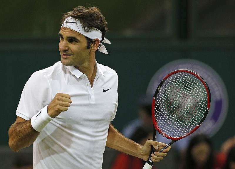 
              Roger Federer of Switzerland reacts after beating Daniel Evans of Britain in their men's singles match on day five of the Wimbledon Tennis Championships in London, Friday, July 1, 2016. (AP Photo/Ben Curtis)
            